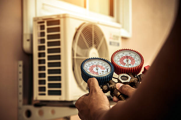 Professional Heat Pump Repair technician working in Pineville, PA